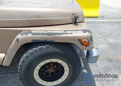 1999 Jeep Wrangler Sahara z USA, uszkodzony, nr VIN 1J4FY49S2XP432180